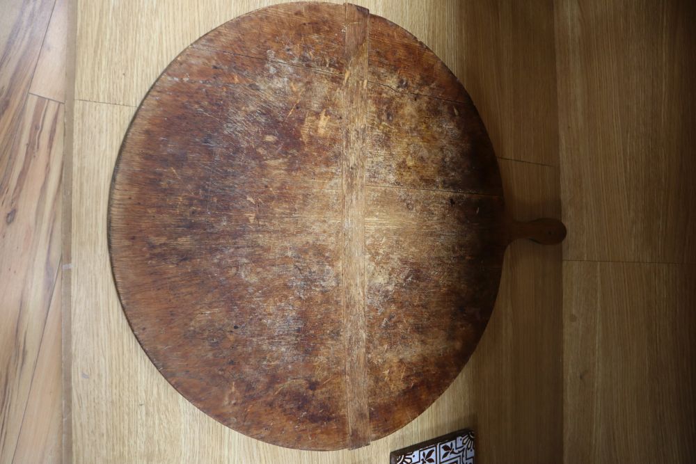 A mid 19th century Swiss painted board, inscribed and dated 1862, diameter 73cm